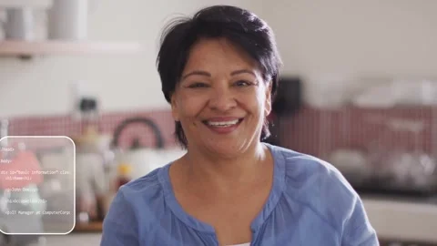 Vertical video: UI panels appearing, Senior Indian woman smiling in kitchen, Stock Footage 334120510