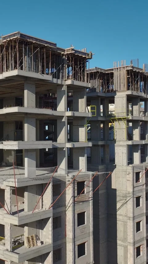 Vertical Video Unfinished Concrete Building with Open Floor Layout and Stock Footage 342453299