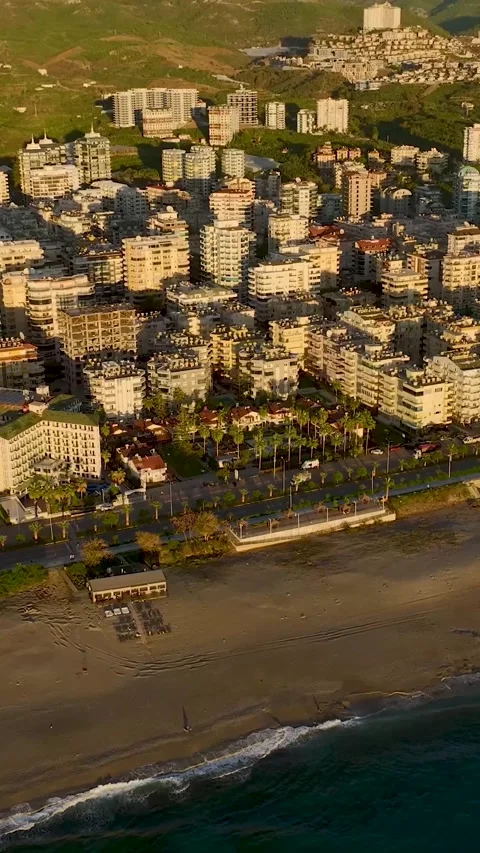 Vertical Video: A unique complex of villas on the Mediterranean coast features Stock Footage 297629696