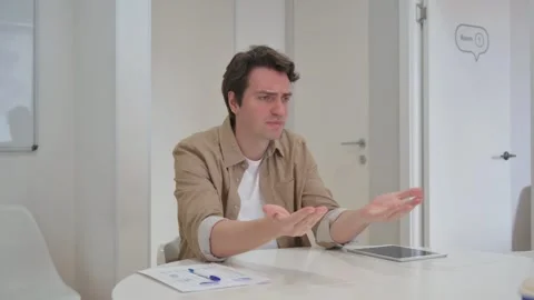 Vertical Video, Unsatisfied Young Creative Man Sitting in,fice Stock-Footage 312914137