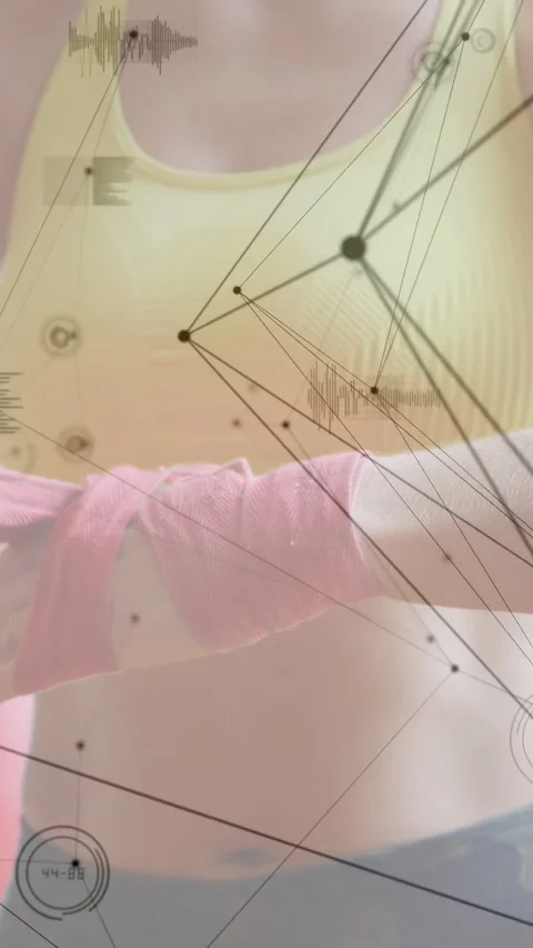 Vertical video: Upon band entry woman wrapping forearm for workout while Stock Footage 333174947