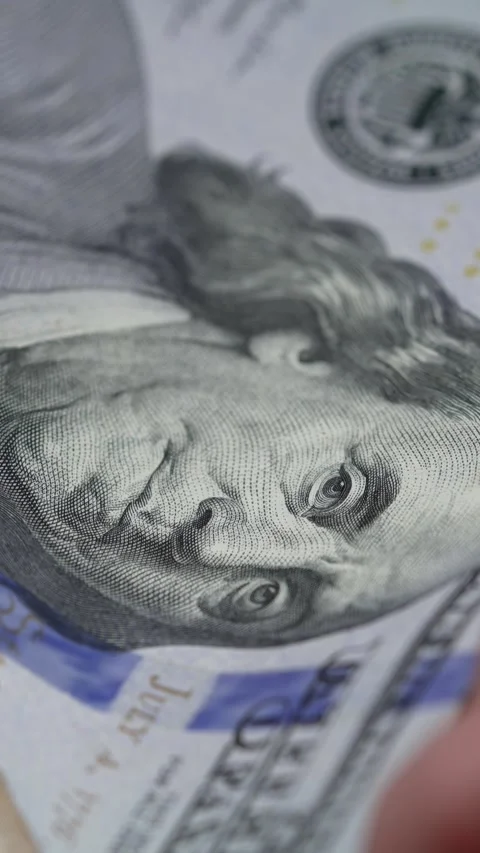 Vertical video of US currency - dollars ... | Stock Video | Pond5