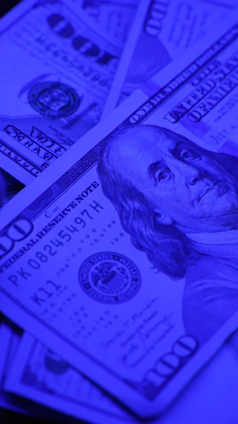 Vertical video of US currency - dollars ... | Stock Video | Pond5