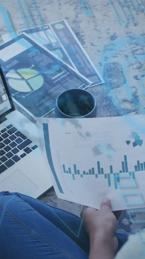 Vertical video: User holding and shifting chart while checking data, blue Stock Footage 343902282