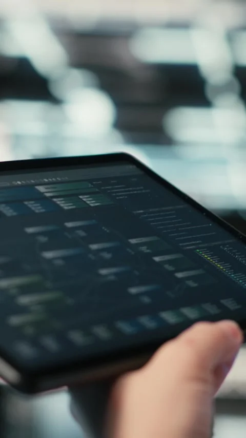 Vertical video Using coding application, tablet and programmer in data center Stock Footage 329319097