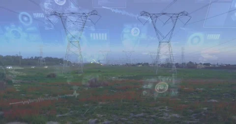 Vertical video: Utility pylons standing in field receiving feed and showing Stock Footage 334036558