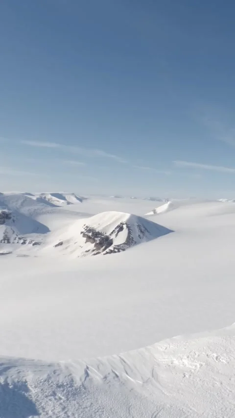 Vertical Video of Vast Arctic Snow Landscape in Remote Svalbard Stock Footage 340036330