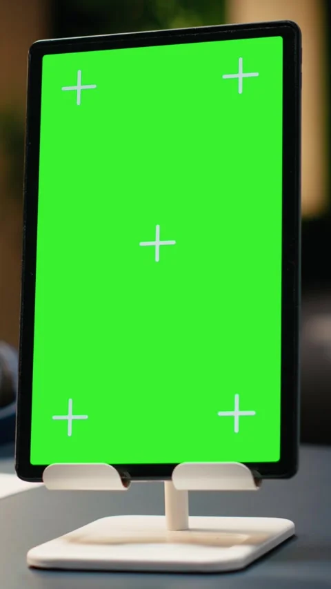 Vertical Video Vertical chroma key screen tablet in contemporary empty office Stock Footage 334104659