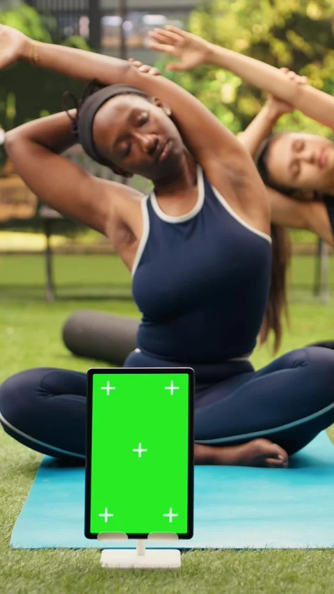 Vertical Video Vertical green screen mockup on tablet with editable display Stock Footage 346615419