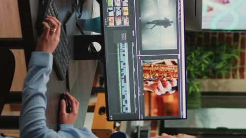 Vertical video: Videography expert editing video footage in post production Stock Footage 223600483