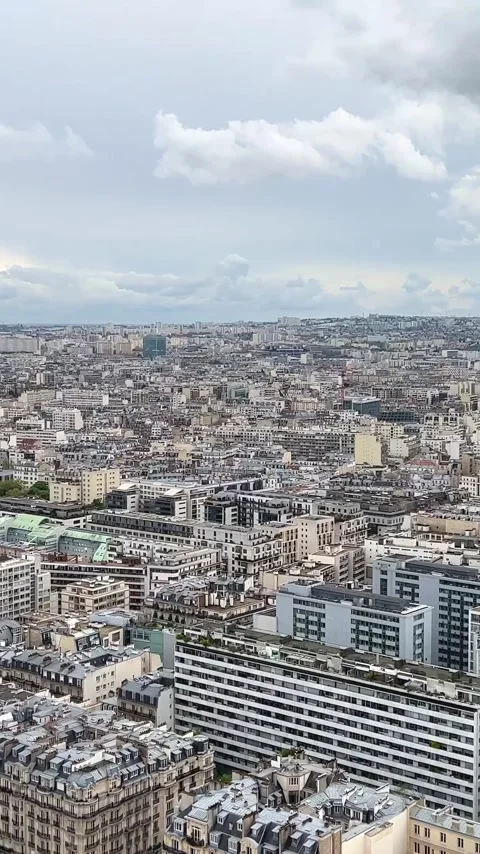 Vertical video View from the Eiffel Tower on the snow-white buildings of Paris Stock Footage 244255145