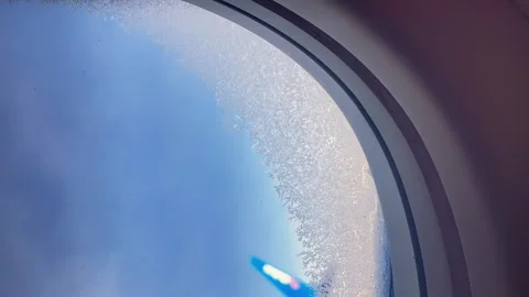 Vertical video. the view from the plane window. the window of the plane. Stock Footage 276092802