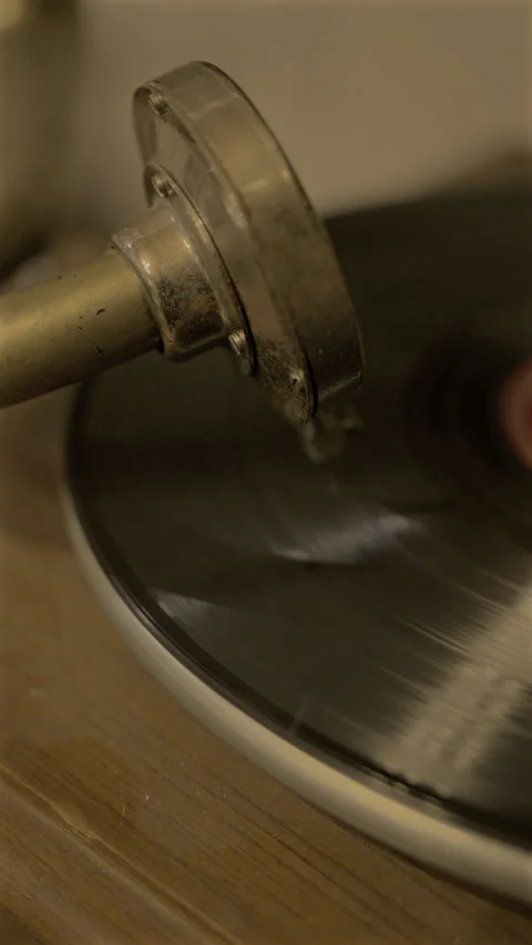 Vertical video of vintage record spinning on gramophone Stock Footage 340031930