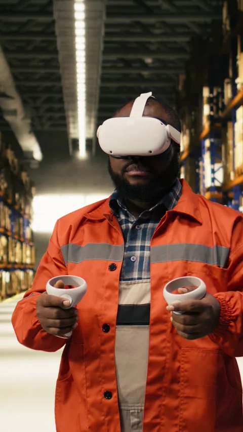 Vertical Video VR glasses demonstration, in warehouse facility, with black Stock Footage 333090069