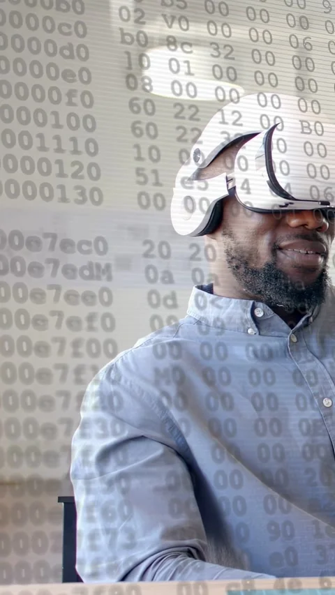 Vertical video: VR user starting tech demo, code overlay flowing from headset Stock Footage 333542239