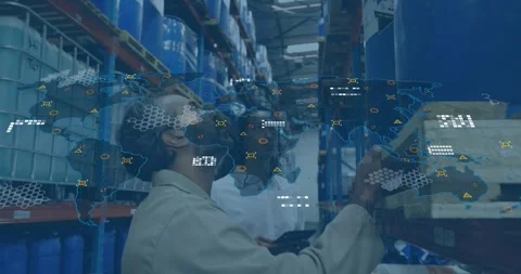 Vertical video: Walking aisle lead using tablet tech checking drums overlay Stock Footage 330540414