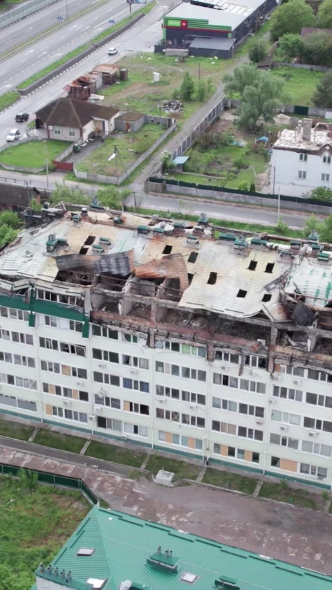 Vertical video of a war-torn apartment building in Ukraine Stock Footage 196114584
