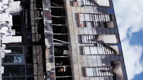 Vertical video of the war in Ukraine - destroyed shop building in Bucha Stock Footage 202167432
