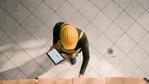 Vertical video Warehouse coordinators examine parcels Stock Footage 251235407