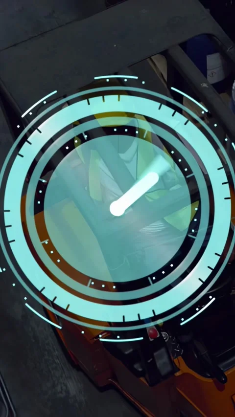 Vertical video: Warehouse operator responding to pulsing cyan clock, steering to Video stock 330655625
