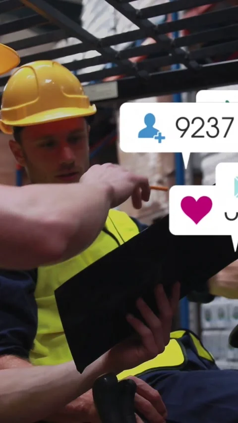Vertical video: Warehouse worker checking stock after coworker pointing, icons Stock Footage 334604695