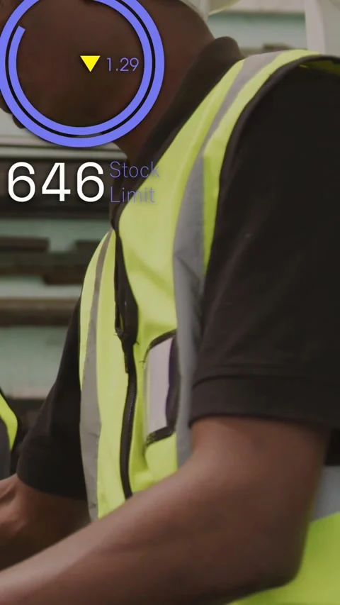 Vertical video: Warehouse worker leaning, monitoring Stock Limit overlay Stock Footage 331168857