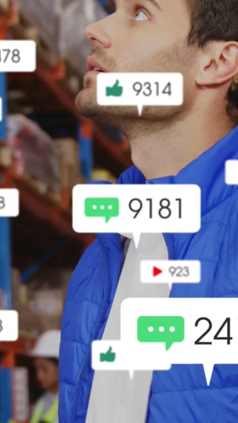 Vertical video: Warehouse worker scanning racks looking up causing icons Stock Footage 334598705