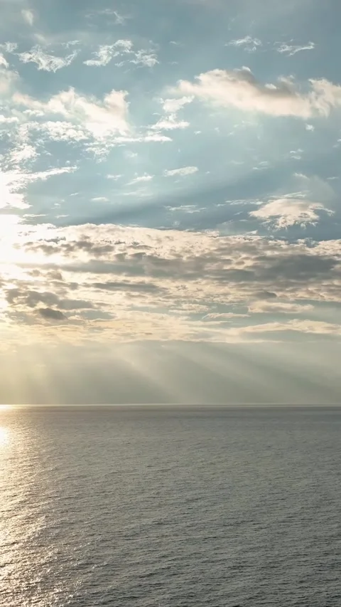 Vertical Video: Warm Sunset Over the Mediterranean Coastline with Golden Light Stock-Footage 297714166