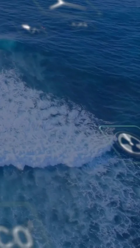 Vertical video: Wave crest rising and breaking making foam spread as AR icons Stock Footage 330580972
