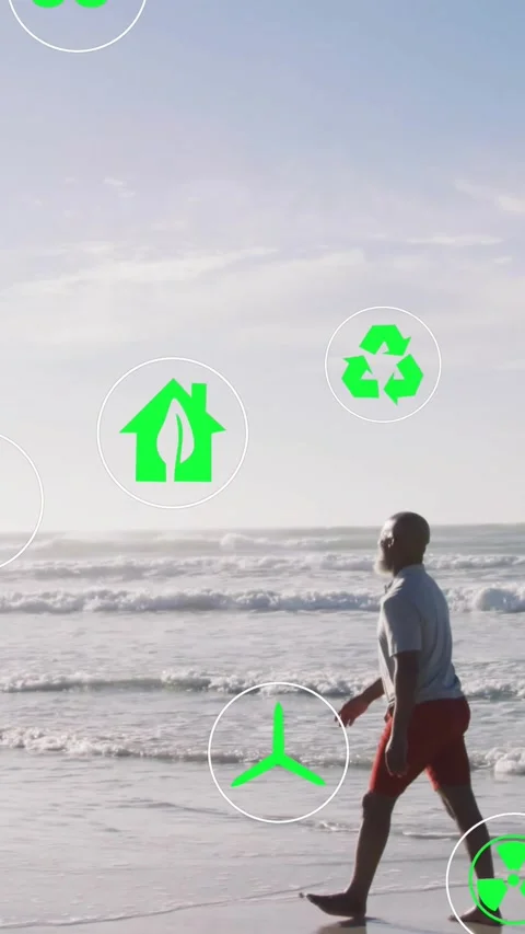 Vertical video: Waves nudging senior man walking shore eco icons shifting Video stock 330430210