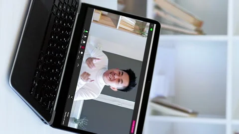 Vertical video web communication man laptop office Stock Footage 255114061