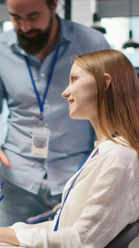 Vertical video Welcoming team assisting intern developing artificial Stock Footage 312769622