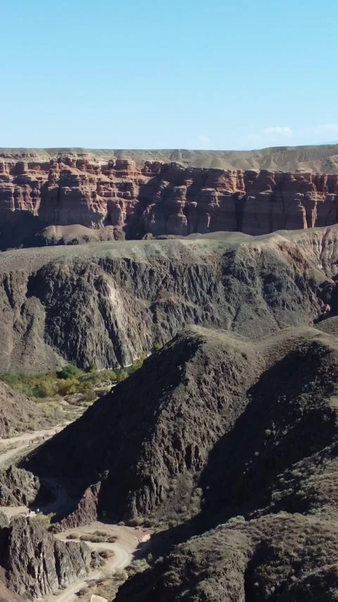 Vertical video: Wide sandstone valleys panorama, Martian Charyn Canyon, Kazakhst Stock Footage 336692532