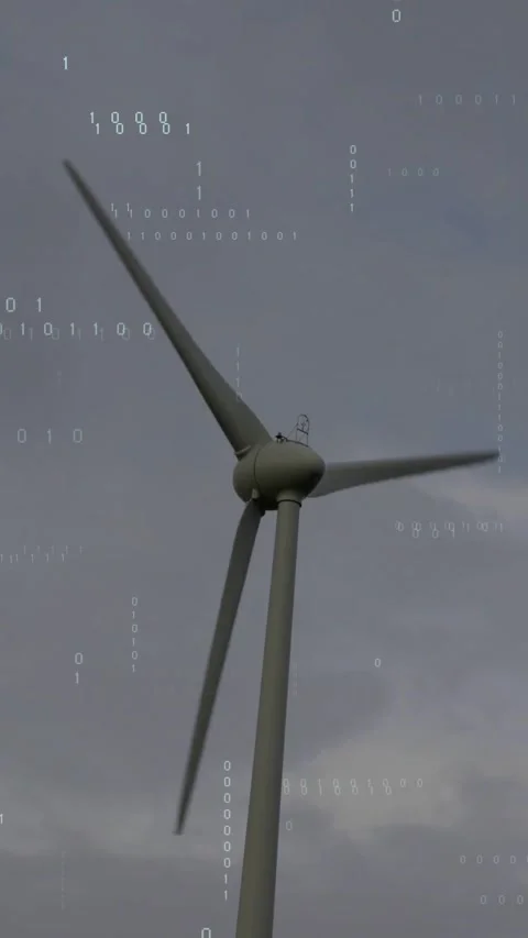 Vertical video: Wind turbine rotating from wind, generating power while binary Stock Footage 332336164
