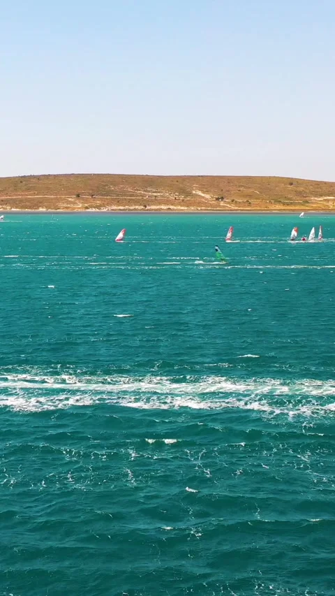 Vertical video of windsurfers Video stock 292606802