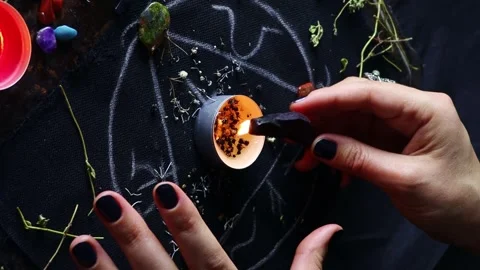 Vertical video, Witch hands performing magic rite with the help of magical altar Stock Footage 246404584