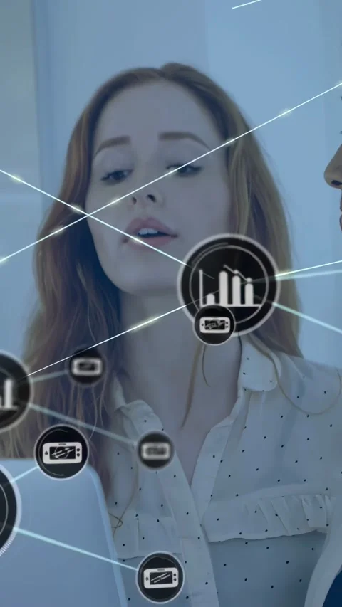 Vertical video: Woman analyzing tech data on laptop HUD popping forming chart Stock Footage 334317871