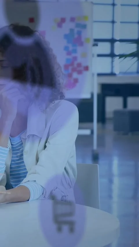 Vertical video: Woman checking code in tech meeting offscreen cue revealing Stock Footage 334549789