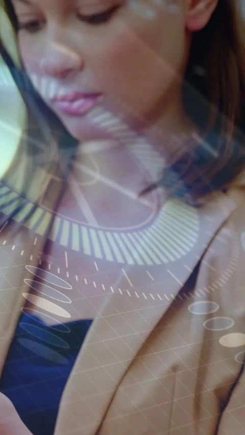 Vertical video: Woman checking data by tapping phone in tech, HUD graphs Stock Footage 333157804