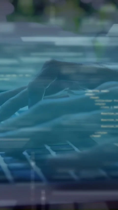 Vertical video: Woman coder starting typing on keys for coding while binary Stock-Footage 335802541