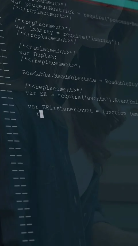 Vertical video: Woman coding at desk, causing code overlay scrolling and filling Stock Footage 333555822