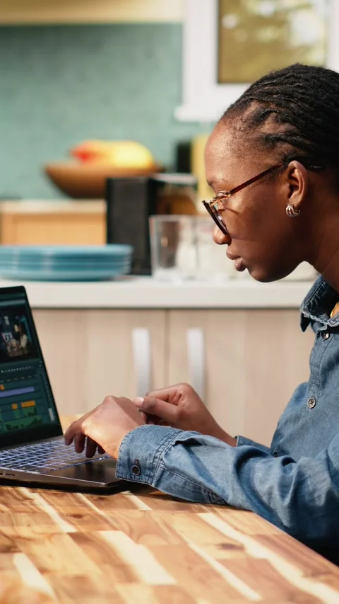 Vertical Video Woman content creator editing clips footage for video production Stock Footage 344530447