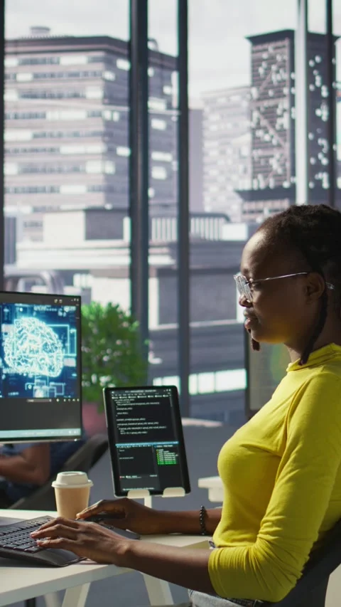Vertical video Woman debugging and optimizing code using AI Stock Footage 319490092
