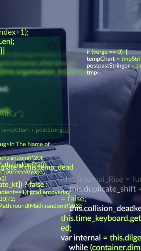 Vertical video: Woman debugging laptop code and typing making green code overlay Stock Footage 333835731