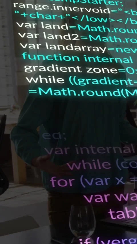 Vertical video: Woman at desk while code starting scrolling on start, covering Stock Footage 331238565