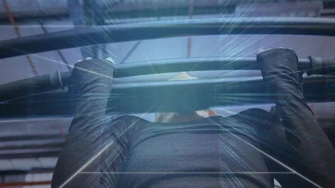 Vertical video: Woman doing pull-ups for fitness, looking up and activating Stock Footage 330622207