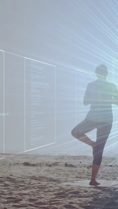 Vertical video: Woman doing tree pose on sand code panels sweeping left across Stock Footage 334025487