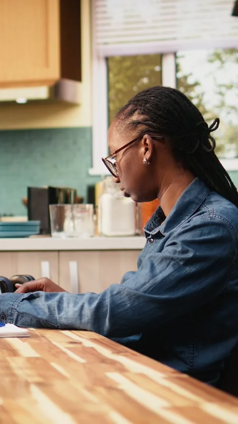 Vertical Video Woman focused on programming and software development tasks Stock-Footage 344529599