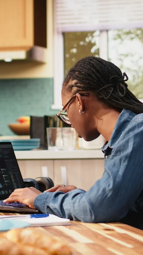 Vertical Video Woman focused on programming and software development tasks Stock-Footage 344529617