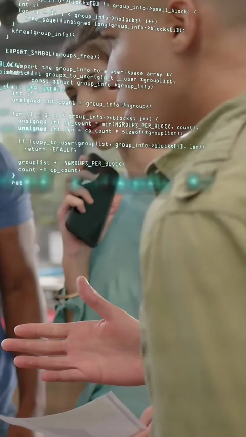 Vertical video: Woman gesturing, code overlay appearing, devs checking phone, Stock Footage 333721120